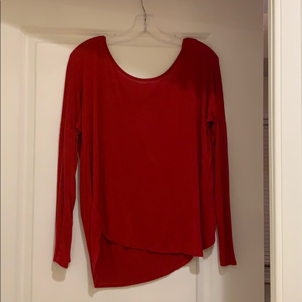 Loose fitting scoop neck top.